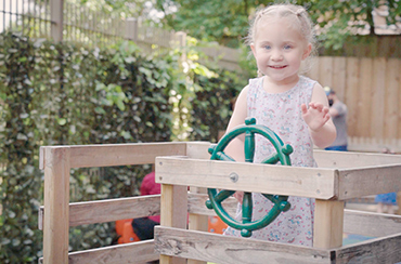 girl playing at a daycare nursery