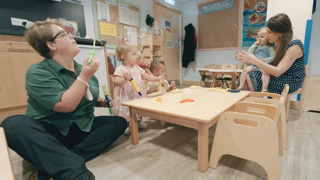 children playing in nursery