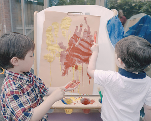 children painting at daycare