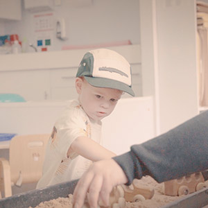 child playing at a daycare in london